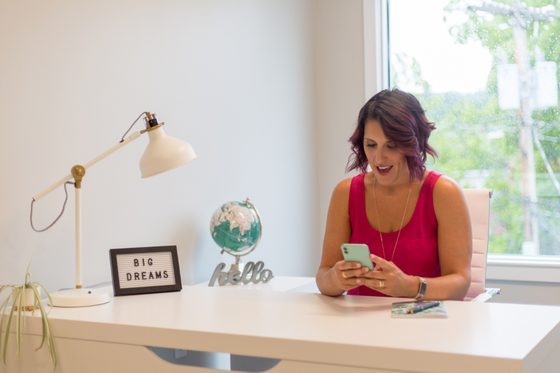 Someone taking a call at a desk