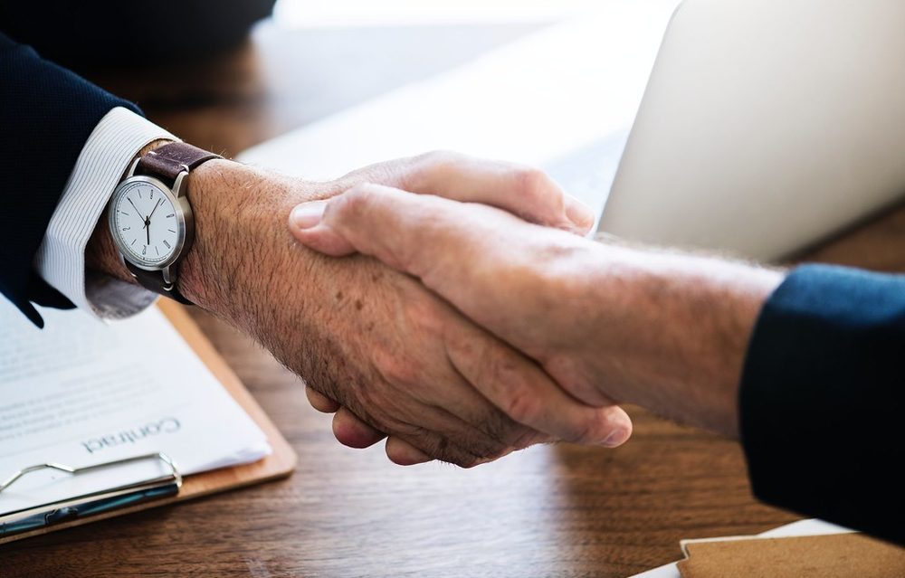 A handshake closing an agreement